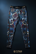 TITAN men's compression tights featuring a vibrant blue wolf, gear, and banner print with a black branded waistband.