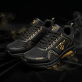 TITAN men's basketball shoes in matte black with gold accents, metallic logos, mesh detailing, and smoke effects.