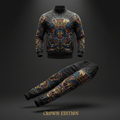 Black TITAN tracksuit featuring a gold crown and lion graphic with blue, red, and gold accents. Zip-up jacket and pants.