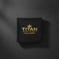 Black TITAN Sport Global Crown Edition microfiber gym towel with gold embroidered crown and logo on dark background.