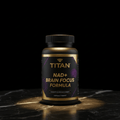 Black supplement bottle with gold text "TITAN NAD+ BRAIN FOCUS FORMULA" on a dark marble surface against black background.