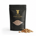 Black pouch of TITAN Organic Raw & Unsalted Almonds with gold branding and a clear window, loose almonds in front.