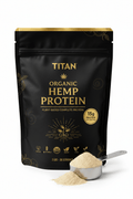 Black TITAN organic hemp protein bag with gold text, plant icons, 15g protein label, and a scoop of beige powder.