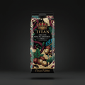 TITAN Organic Unsweetened Macadamia Milk carton with crown logo, tropical leaves, and nuts on a black background.