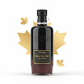 TITAN Organic Maple Syrup in a dark bottle with a gold label and matte gold maple leaf accents on a white background.