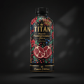 Black bottle of TITAN Organic Pomegranate Juice with floral art, a crown graphic, and gold typography on black.