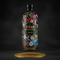 TITAN organic tart cherry juice bottle with intricate cherry, blossom, and wave art on a black background over a gold.