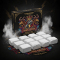 Ten white gym chalk blocks in front of a decorative black box with a lion, crown, and lightning bolt emblem.