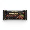 Black wrapper with gold text, featuring a melting chocolate graphic, a chocolate bar, and cocoa beans on a white back.