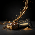 TITAN Peanut Butter Cup protein bar partially unwrapped, showing chocolate coating, creamy filling, and gold accents.