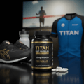 Black bottle of Titan Salt Capsules with gold text, 215mg sodium, 100 capsules, white pills in front, sport gear back.