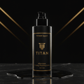 TITAN Sport matte black pump bottle with gold lettering and logo, centered on a dark marble surface.