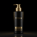 Matte black pump bottle with gold "TITAN" logo and "SPORT FACE WASH" label, featuring water droplets on a black surface.