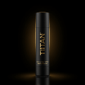 Matte black TITAN Sport Lip Balm SPF 30 stick with metallic gold branding, illuminated against a dark background.