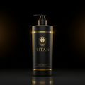 Matte black pump bottle with gold lion logo, "TITAN" text, and gold trim on a dark background with light dust particles.