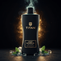 Matte black TITAN Arctic Mint shower gel bottle with gold logo, surrounded by fresh mint leaves and ice on dark base.