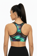 TITAN Sports Bra, Aurora Crown Edition: Green and purple aurora print racerback with gold crown detail and mesh accents.