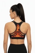 TITAN Phoenix Crown Edition racerback sports bra in black with vibrant red and gold phoenix fire back graphic.