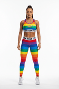 TITAN Sports Bra Rainbow Crown Edition: colorful striped athletic top with gold crown logo and branded waistband.