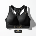 Black high-impact sports bra with racerback, perforated side panels, and gold TITAN branding on chest band.