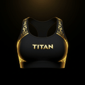 Black high-impact sports bra with gold TITAN logo and decorative gold filigree trim on straps and side panels.
