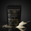 Black Titan organic sunflower seed protein pouch with gold text, flower icon, and scoop of powder on dark surface.