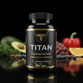 Black bottle of TITAN Vegan Multivitamin with gold text, surrounded by fresh produce on a black reflective surface.