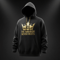 Black hoodie featuring a gold "The Warrior Never Rests" text and crown graphic. Titan Sport Global motivational apparel.