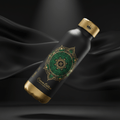 Matte black 32oz insulated bottle with gold crown cap, ornate green and gold mandala, and Crown Edition branding.