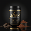 Black tub of Titan Whey Protein Isolate Chocolate with gold text, protein scoop, and chocolate pieces on reflection.
