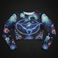 Black long-sleeve crop top featuring a cosmic manta ray, glowing jellyfish, neon florals, and aurora borealis print.