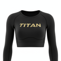 Black long-sleeve ribbed crop top with gold TITAN logo across the chest, featuring a scoop neckline.