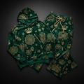 Emerald green velour lounge set with gold crown, floral, and mandala print, featuring a hooded sweatshirt and pants.