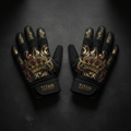 Black TITAN workout gloves with gold crown and tribal graphics, red accents, and adjustable branded wrist straps.