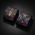 TITAN Crown Edition wristbands with intricate, vibrant lion and eagle designs featuring gold crowns on a black background.