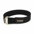 Black TITAN yoga strap with a polished gold D-ring and a branded black patch featuring gold lettering.