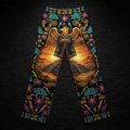 Black lounge pants featuring a golden eagle in a crown, Aztec pyramids, colorful flowers, and lightning bolt patterns.