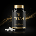 Black bottle of TITAN Zinc with gold logo and text, 90 tablets, on a dark background with elegant gold light trails.