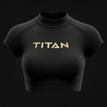 Black short-sleeve high-performance crop top with a mock neck and metallic gold "TITAN" logo on the chest.